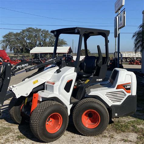 articulated lift arm skid steer|Bobcat L28 Small Articulated Loader .